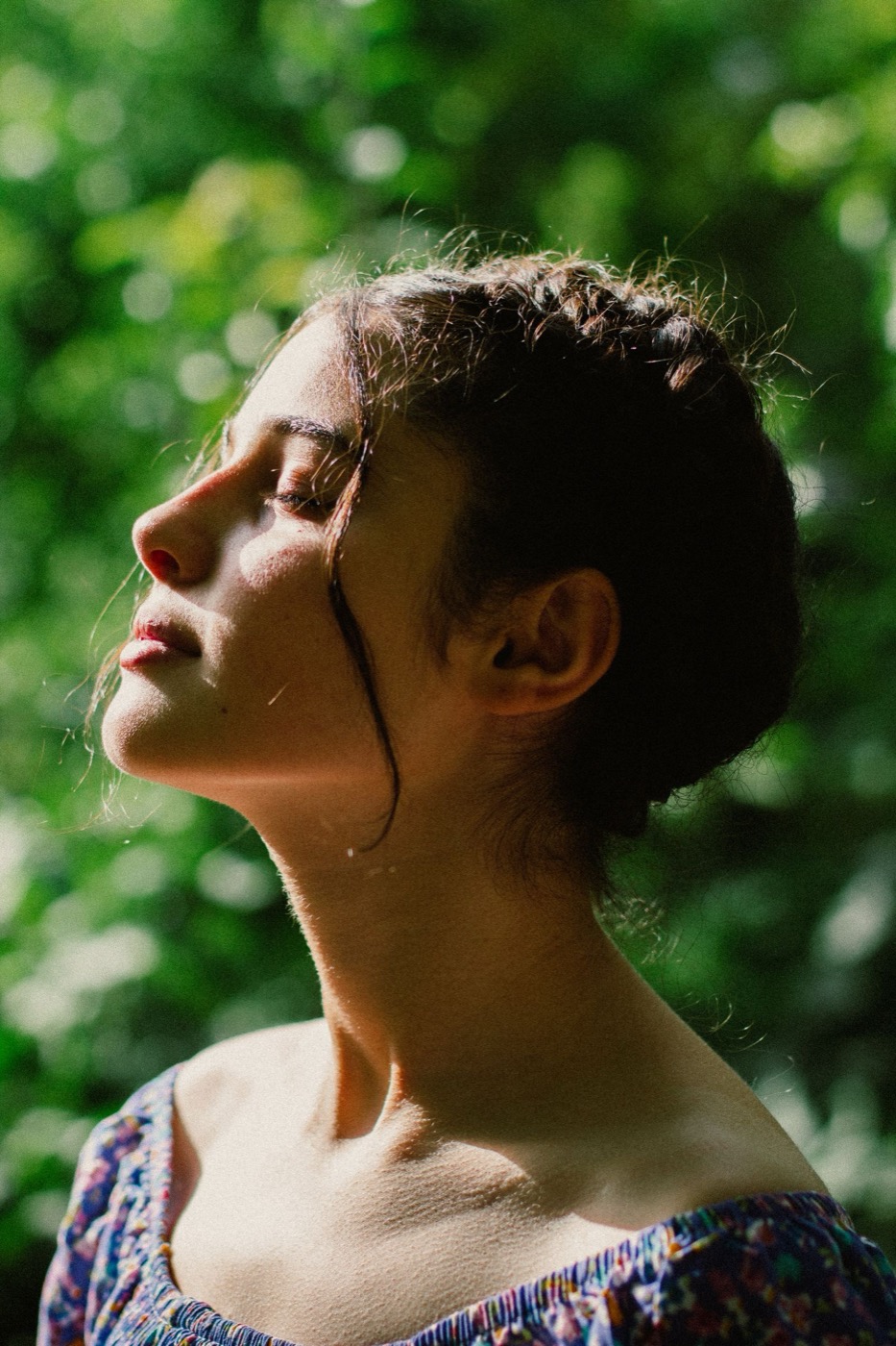 A person breathing freely in the sunlight, recovered